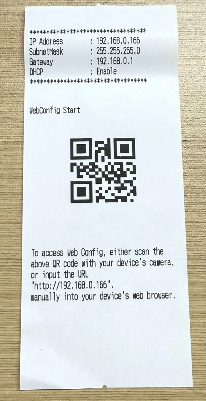 セルフテスト印刷の用紙、IP Address と QR コードが確認できる